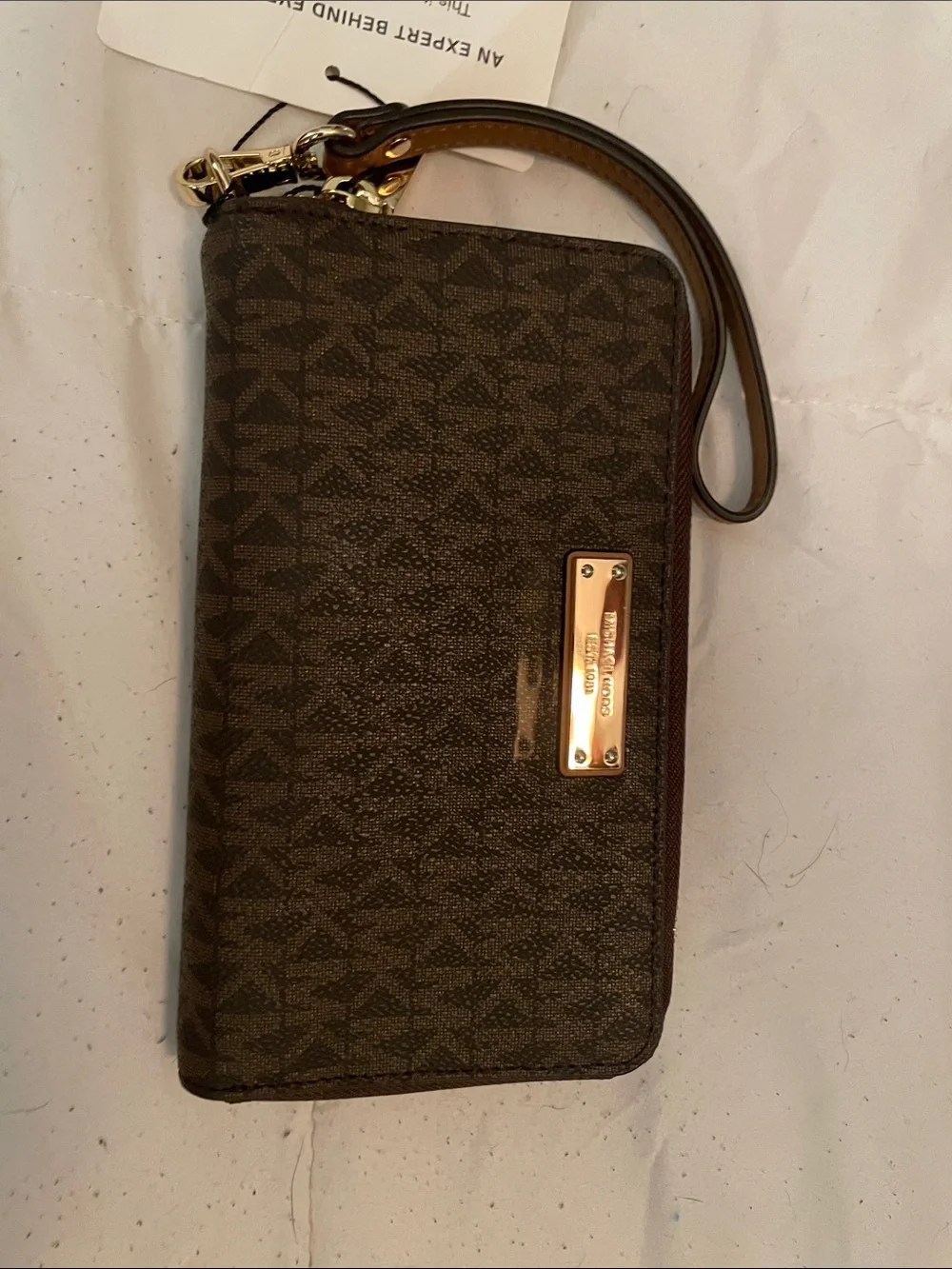 Michael Kors Brown Monogram Wristlet with Gold Plate